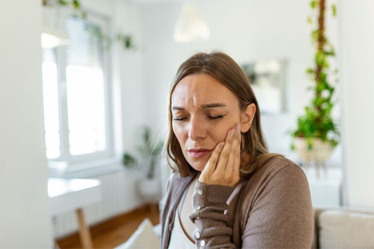 Woman with tooth pain