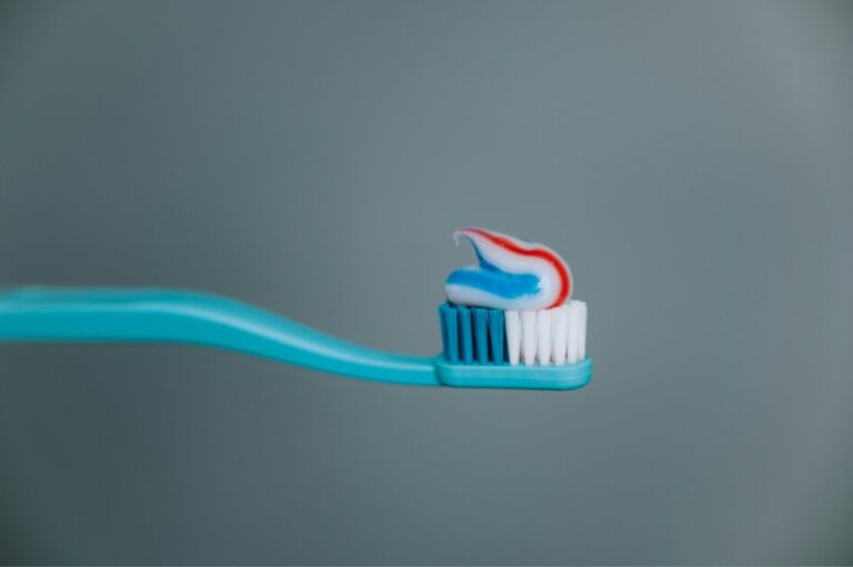 Toothbrush with fluoride toothpaste