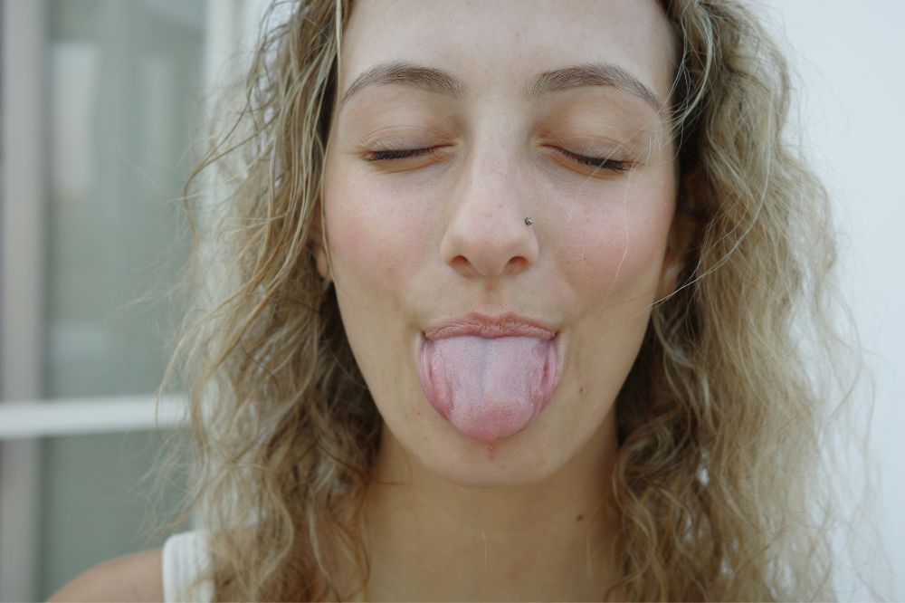 Woman sticking out her tongue
