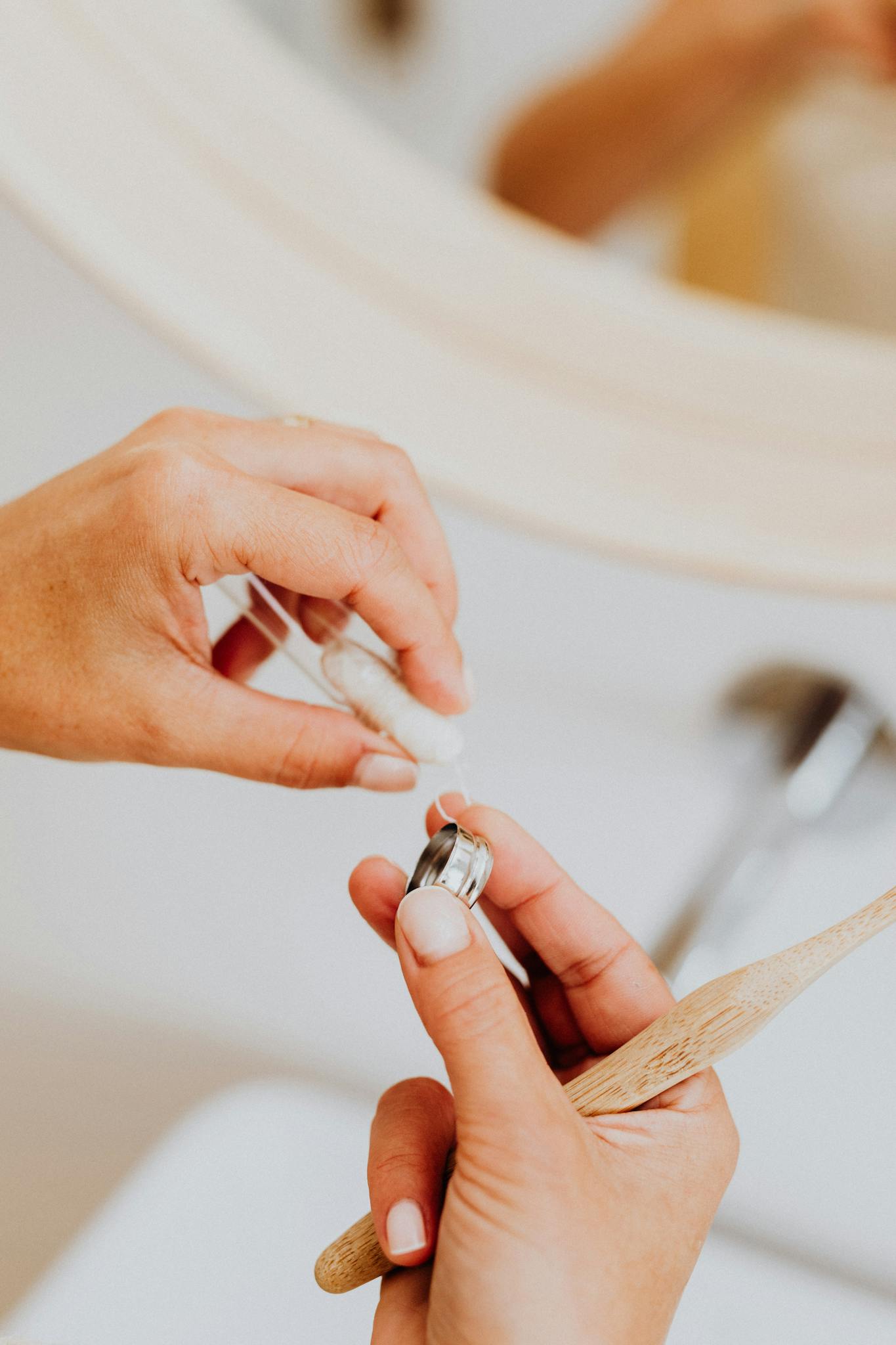 Eco-friendly focus on dental hygiene with sustainable bamboo toothbrush and dental floss.