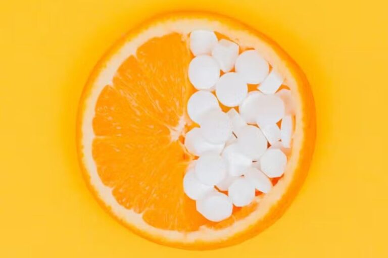 Orange with white pills inside of it